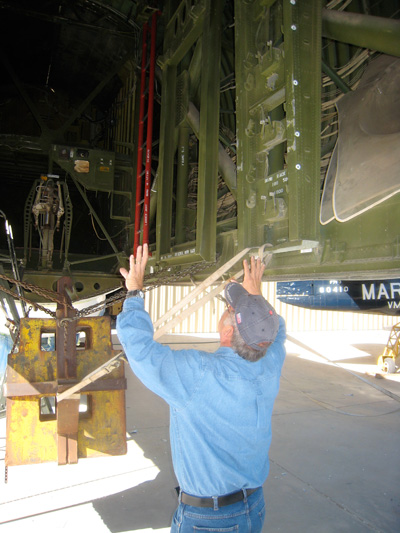 John Heibler showing B-36 Bomb Bay